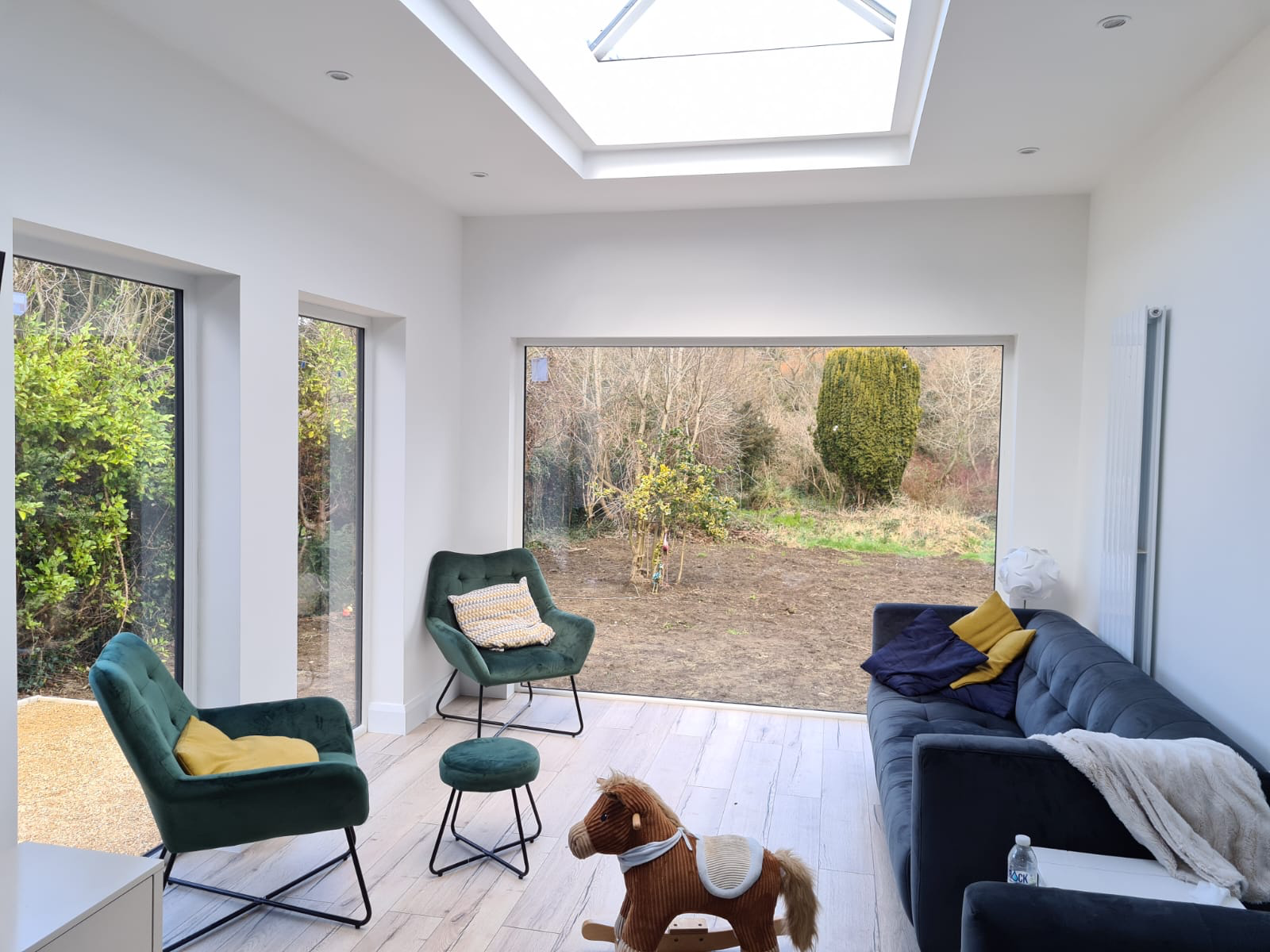 Interior of cedar garden room with corner glazing and rooflight, Co. Dublin