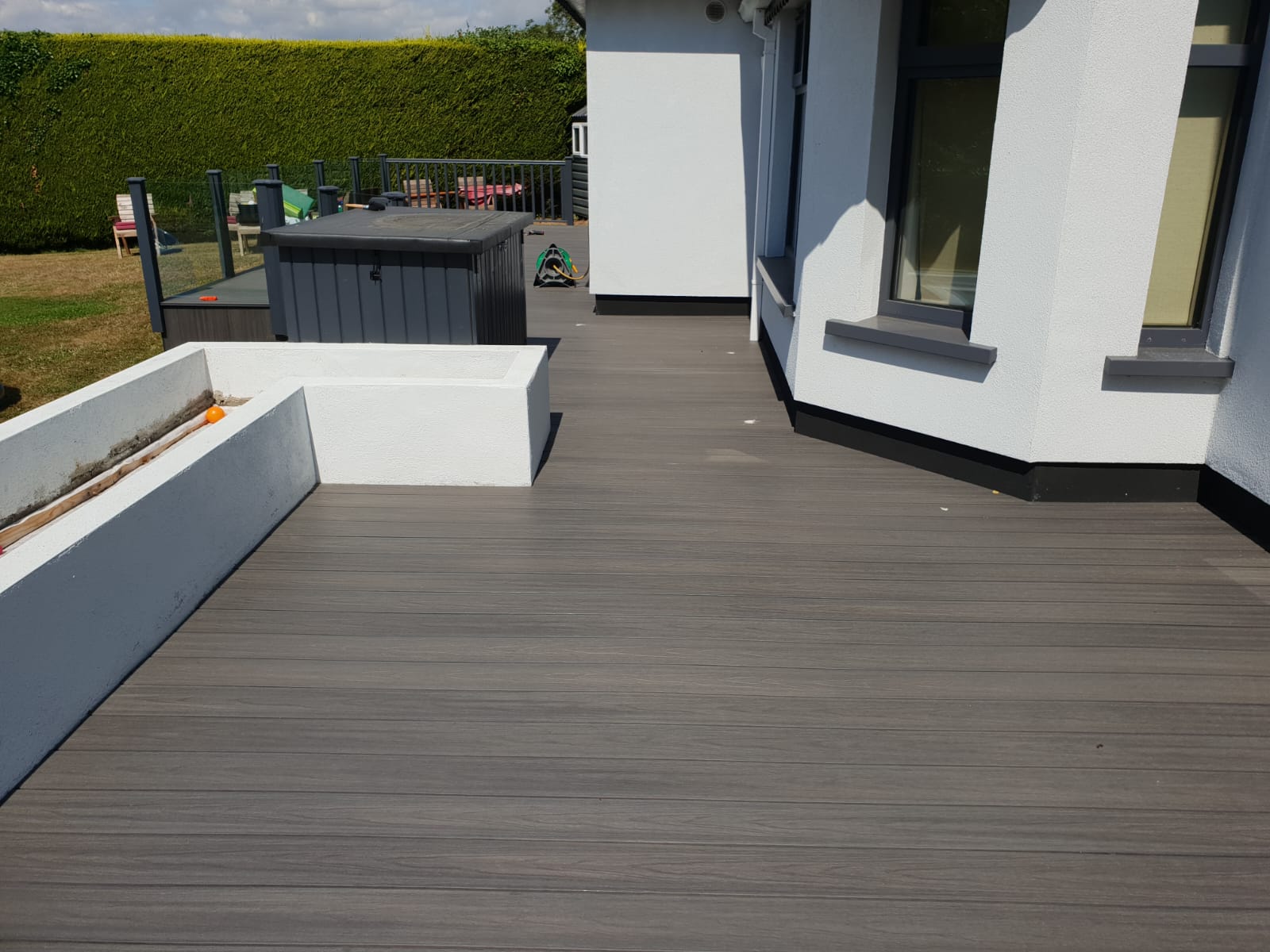 Grey composite decking with hot tub Dublin